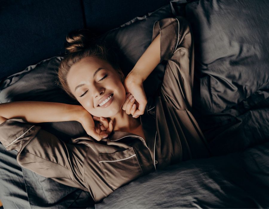 calm-young-man-with-beard-sleeps-bed-soft-pillow-blanket-bedroom-interior-1